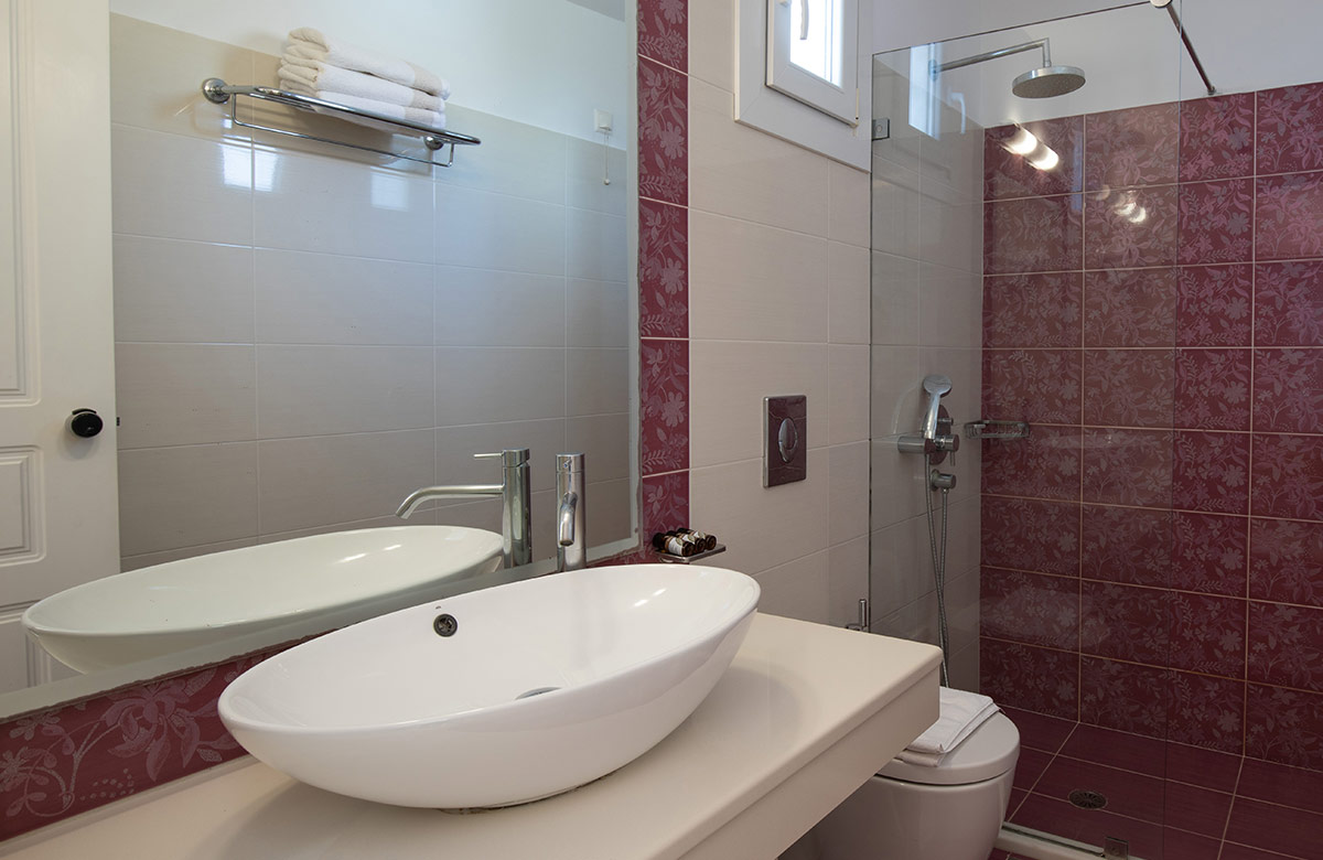 Bathroom with walk-in shower in Triple Standard Room at Mykonos Town hotel