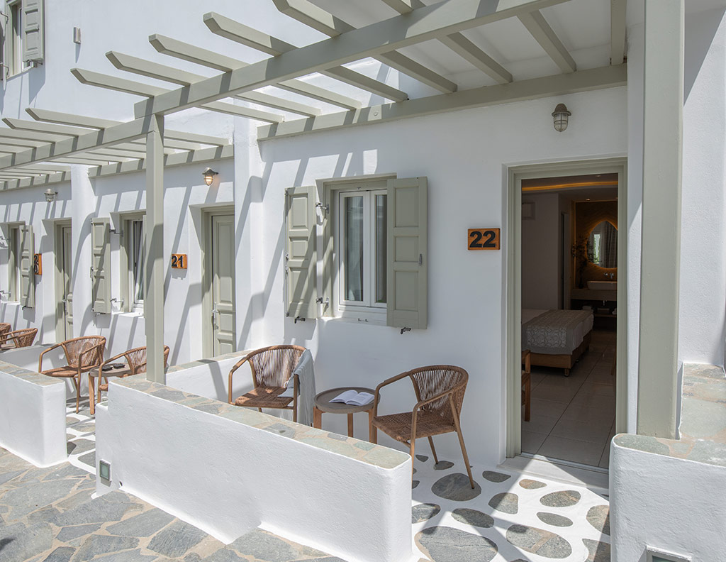 Classic Room veranda with outdoor seating at Damianos Hotel in Mykonos Town