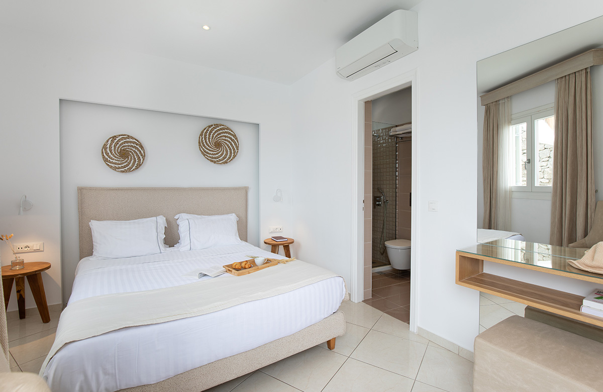 Cozy Small Room at Damianos Hotel Mykonos featuring soft lighting, double bed and minimalist interior