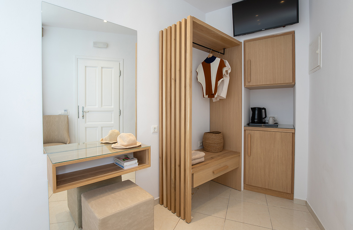 Cozy Small Room No View interior at Damianos Hotel Mykonos with minimalist wood elements and compact layout