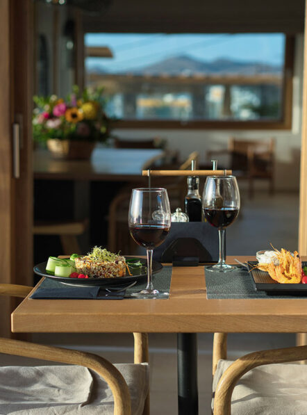 Snack bar dining at Damianos Hotel in Mykonos Town with light meals and wine